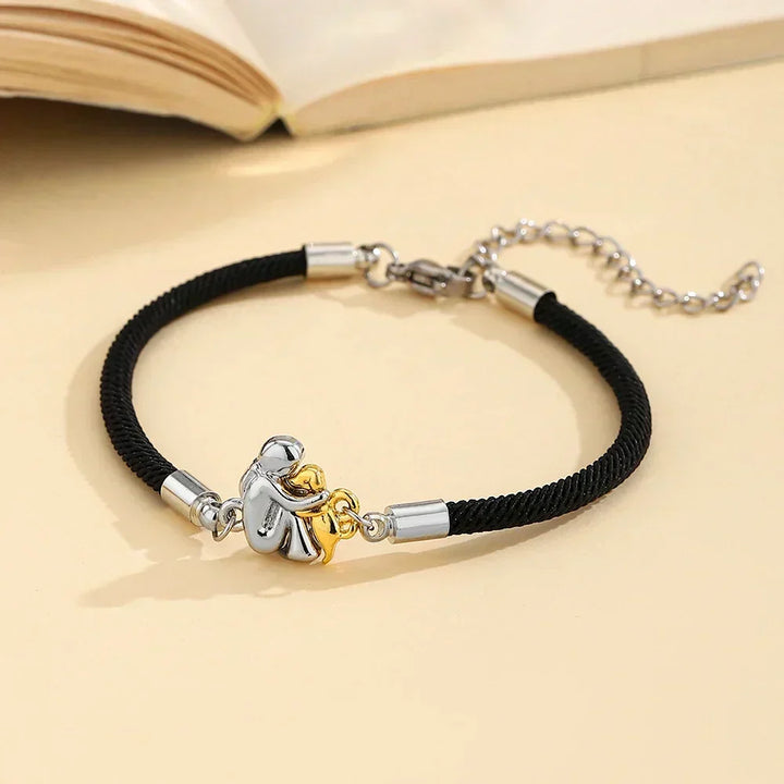 Katy™ – Bracelet à cordon avec icône de chien